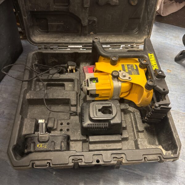 Dewalt DW073 laser level inside its open carry case.