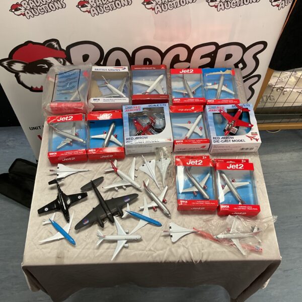 Diecast model planes collection featuring Jet2, British Airways, and Red Arrows.