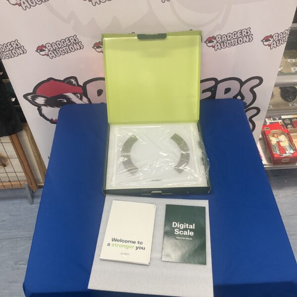 Boxed digital kitchen scale for cooking and baking.