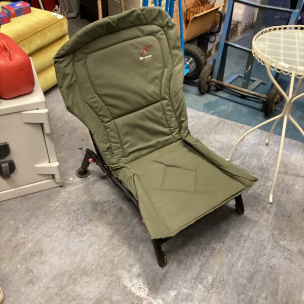 Green Dragon carp fishing chair, folded and ready for use.
