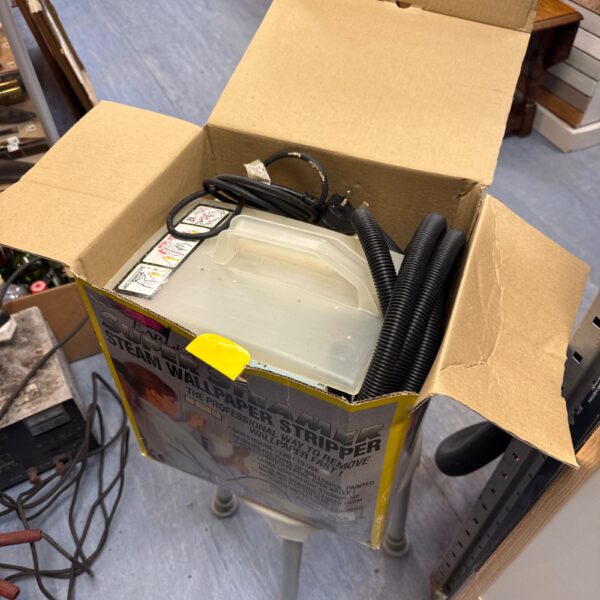 Earlex Super Steamer wallpaper stripper for easy removal.