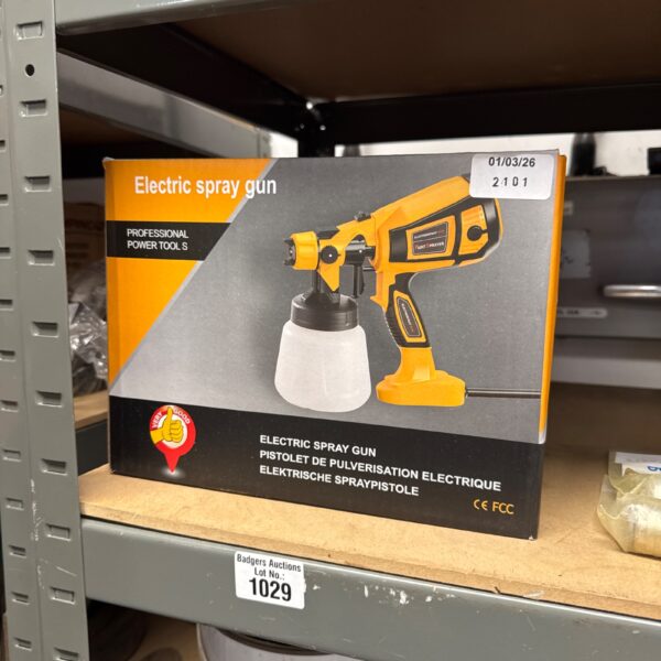 New electric spray gun in original packaging, ready for use.