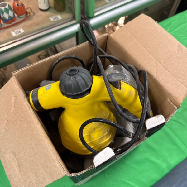 Yellow Elitech handheld steam cleaner for home cleaning.