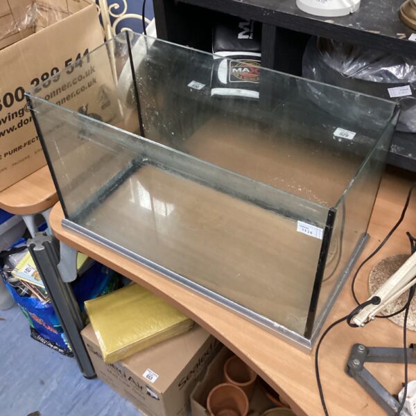 Glass fish tank measuring 12x24x14 inches, ideal for aquarium setups.