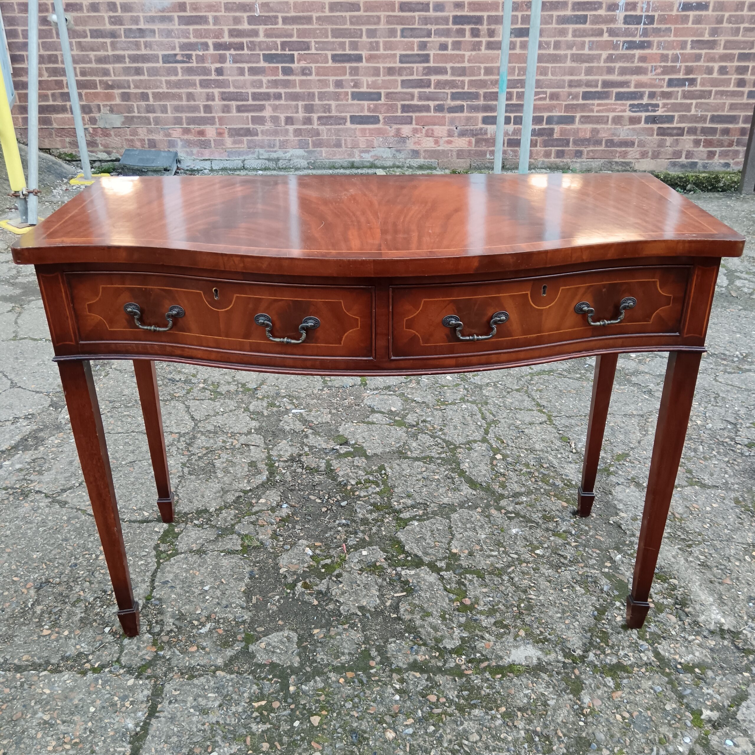 643 Georgian mahogany serpentine fronted console table