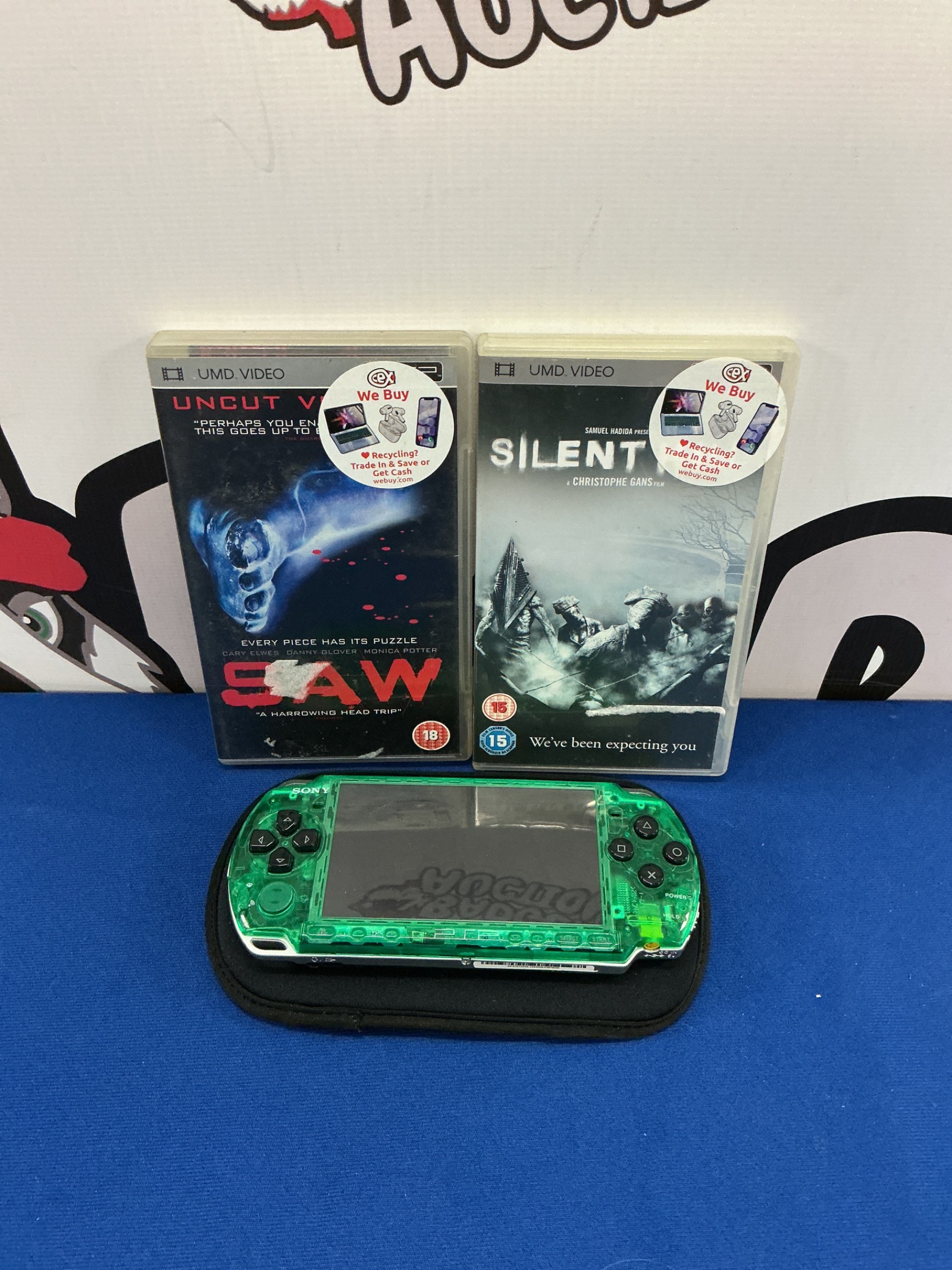 174 Green Sony PSP console with umd movies
