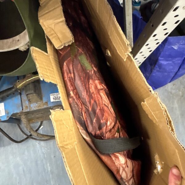 Headerbs pop up tent partially visible in cardboard box.