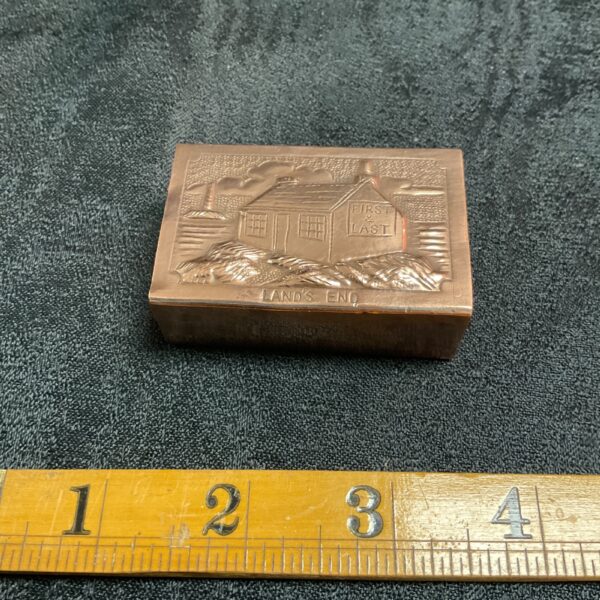 Antique Herbert Dyer Nynin copper matchbox holder with repoussé design.