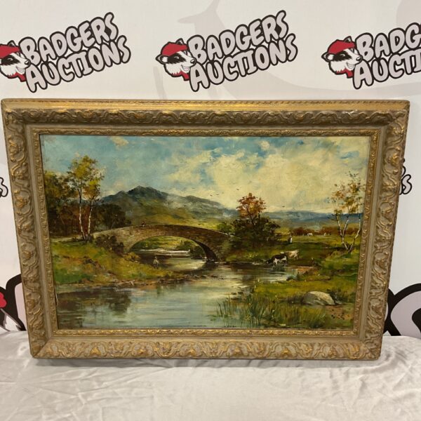 Antique oil painting of a highland landscape with cattle and a gilt frame.