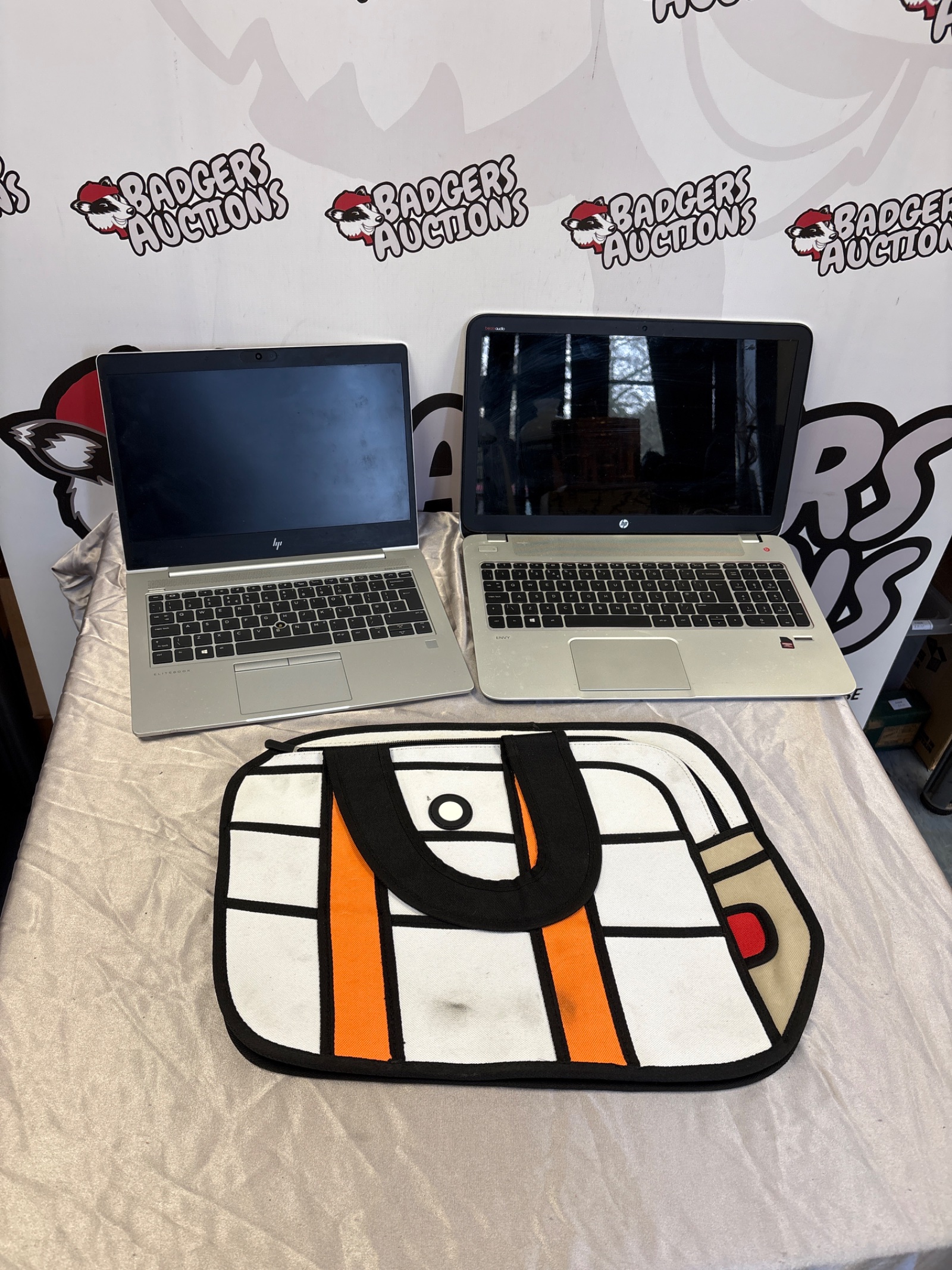 209 Two HP laptops including model HSN – L12C and protect Smart with bag