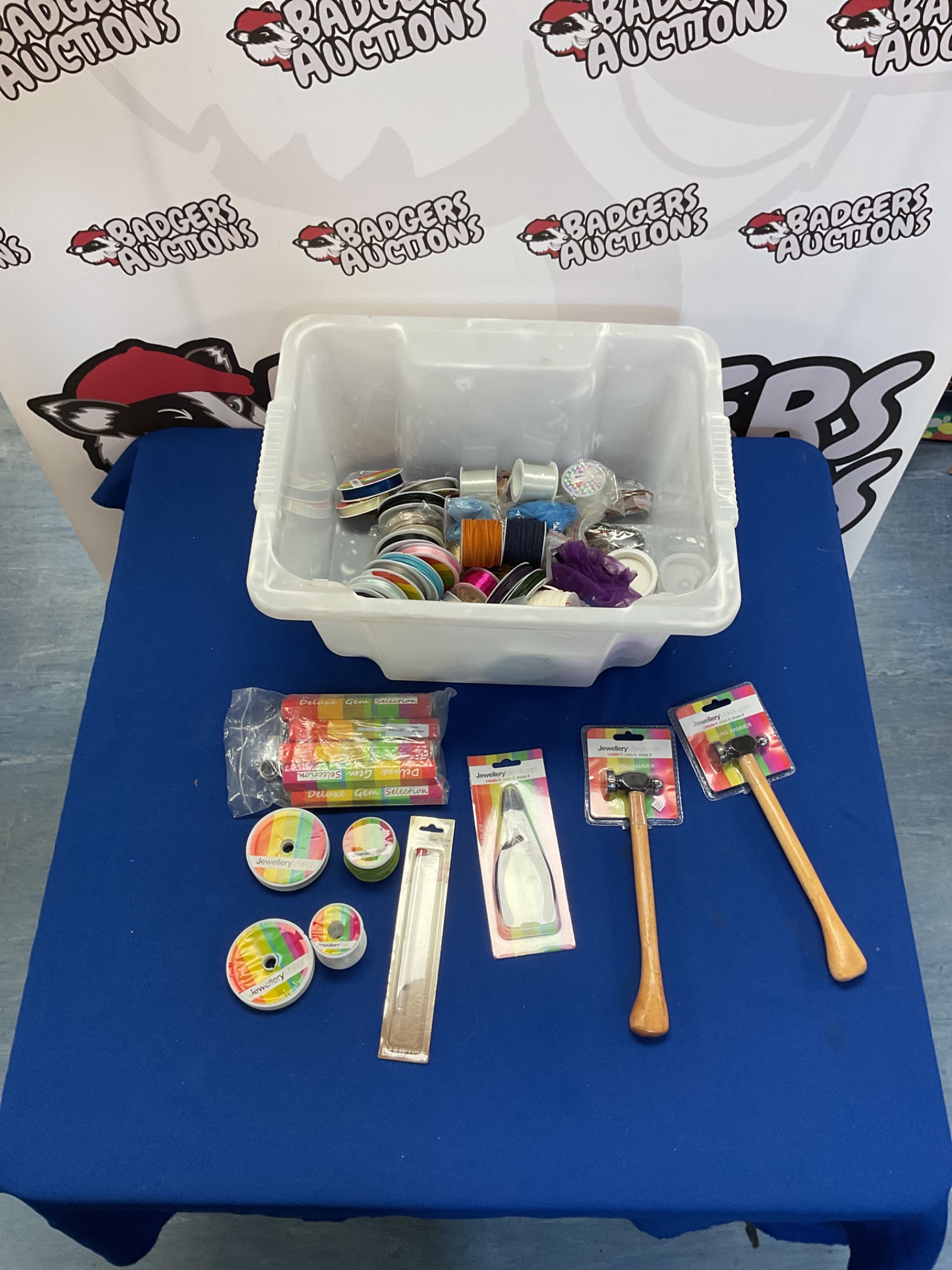 415 Lot of JewelleryMaker.com products incl. variety of thread spools, Deluxe Gem selection, 2 Chasing Hammers, pliers, tool for smoothing wire ends