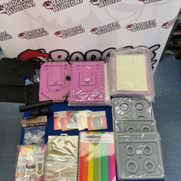 Jewellery making lot with trays, magazines, and DVDs for crafting.