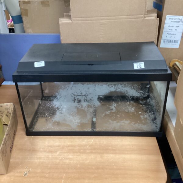 Front view of a used Juwel aquarium fish tank.