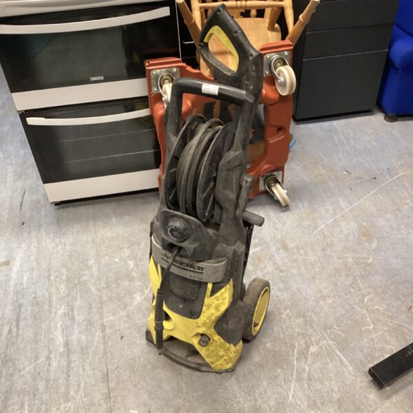 Used Karcher pressure washer for outdoor cleaning and garden maintenance.