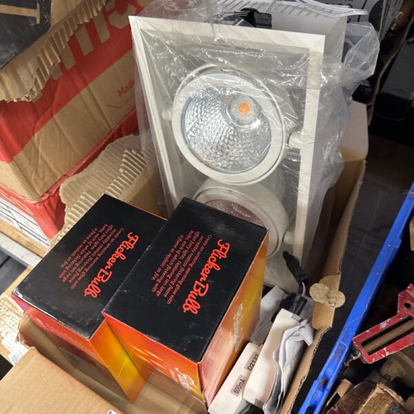 LED workshop lamp and boxes of flame effect fairy lights.