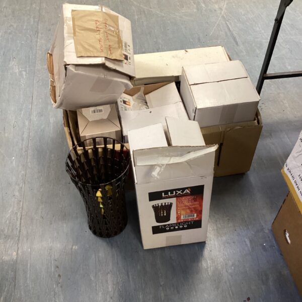 Luxa flame effect lighting basket in original packaging.