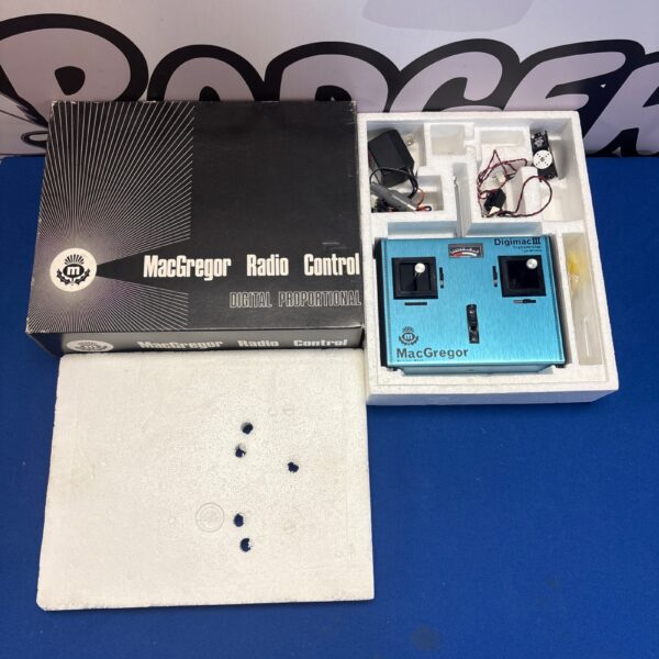Vintage MacGregor Digimac III transmitter in its original box.