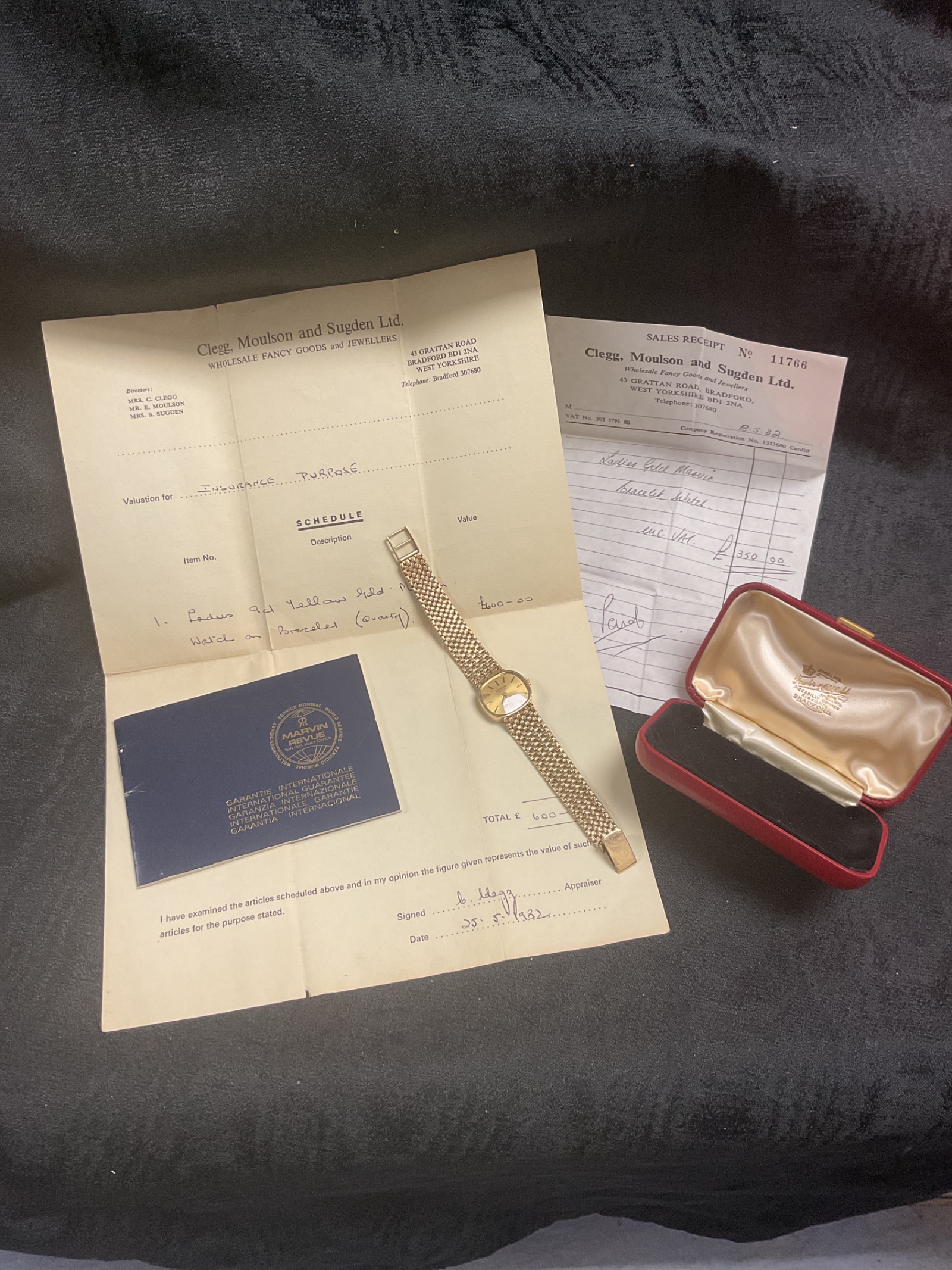 946 Marvin revue 9ct gold watch and bracelet 33.6g gross With papers and original receipts