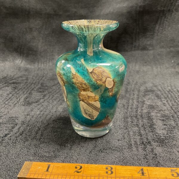 Signed Medina glass vase with turquoise and amber swirls.