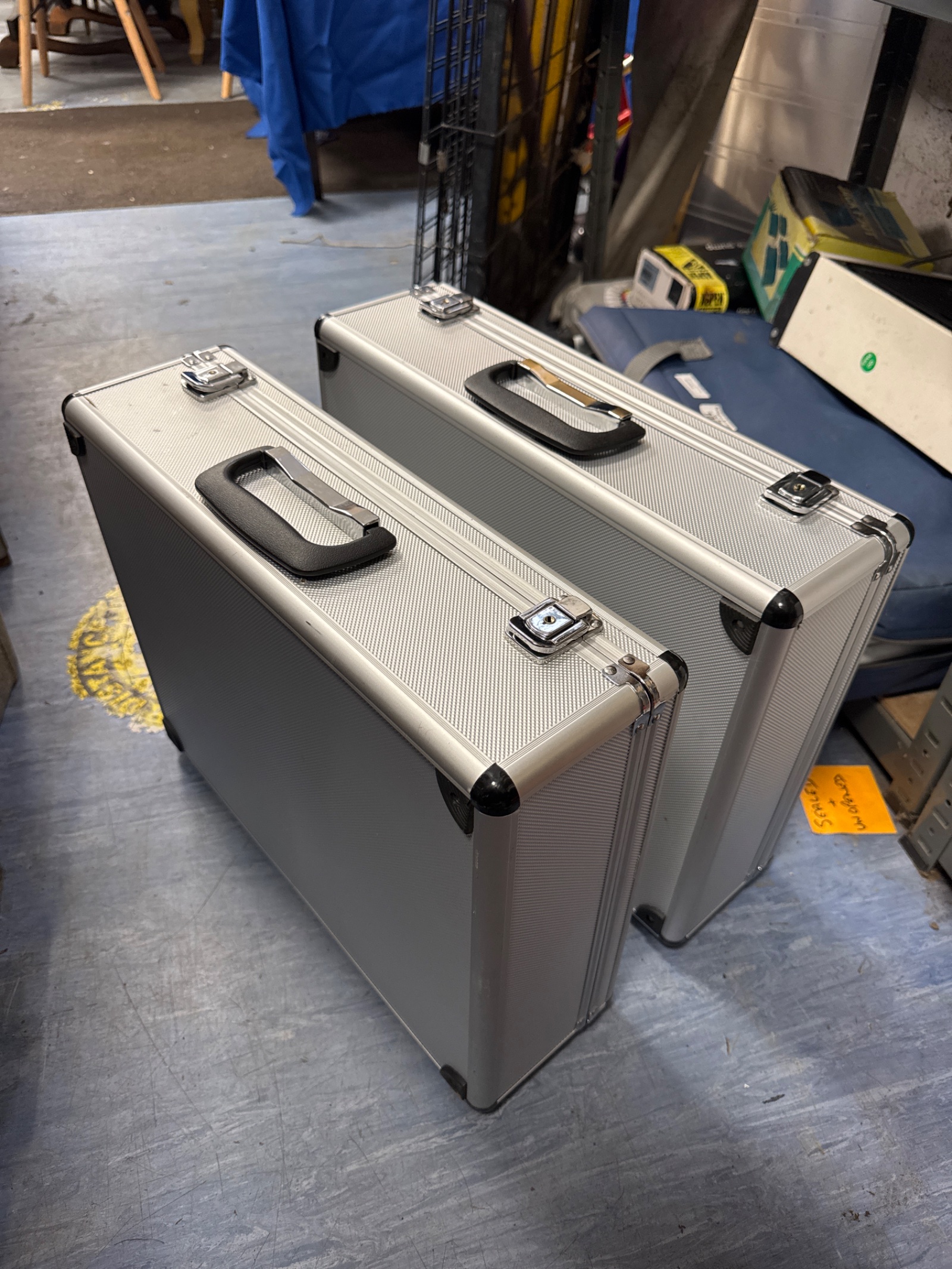 1026 Two metal transit cases 18” length approx