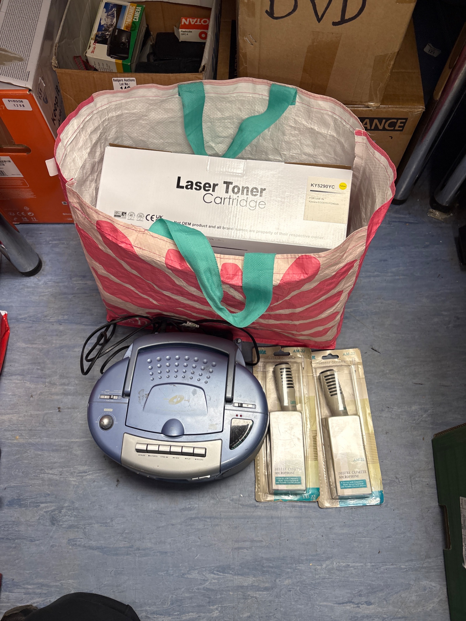 168 Bag of mixed inc minato compact disc player, three boxes of toner cartridges and two cassette microphones
