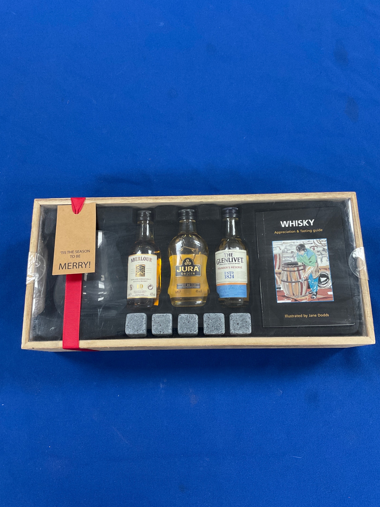 1022 Set of miniature whiskeys with glass & stones