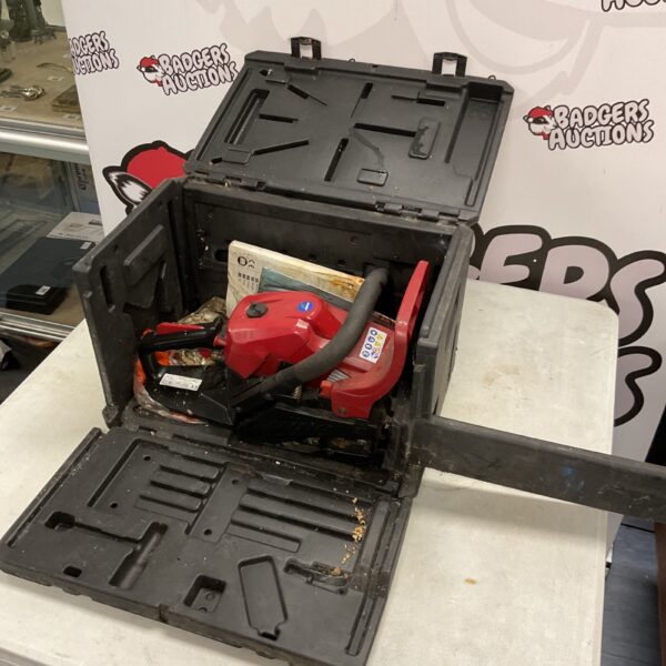 Mountfield petrol chainsaw kit in a transit case with tools and spare chains.
