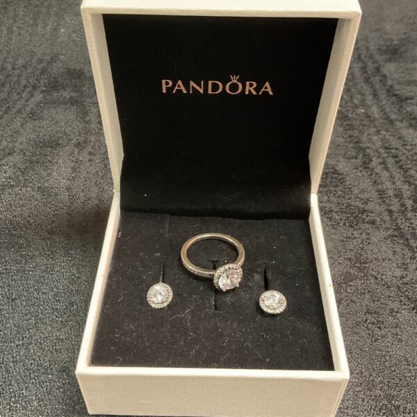 Pandora silver ring and earring set displayed in a presentation box.