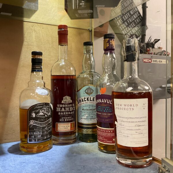 Part drunk whiskey collection including Thomas Handy Sazerac and New World Projects.