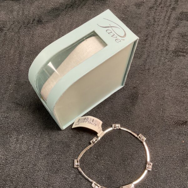 Silver-tone pave CZ bracelet presented in its original box.