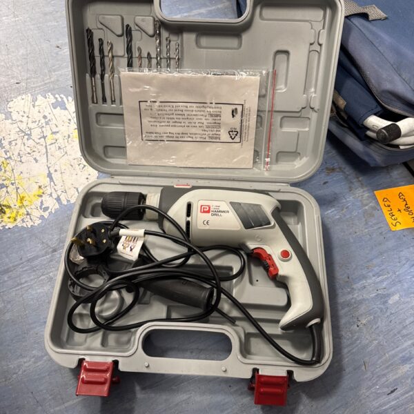 Performance Pro 710w hammer drill in carrying case.