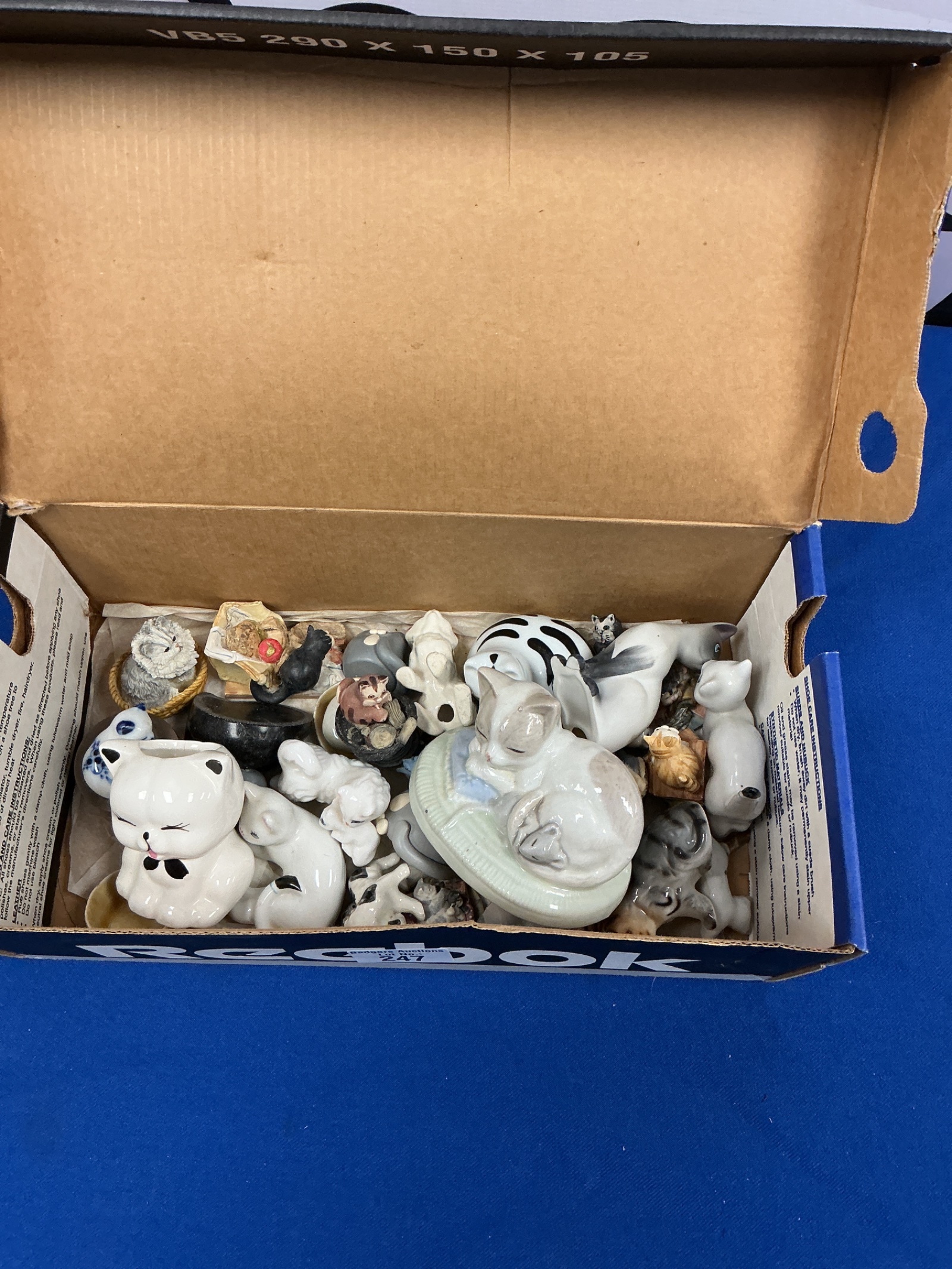 247 Collection of porcelain cat figurines