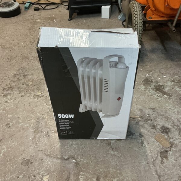 Compact 500w portable electric heater in used condition.