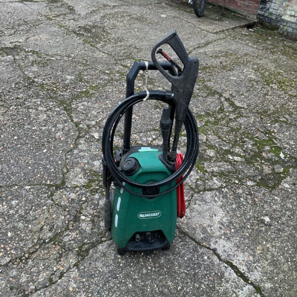 Front view of a used Qualcast pressure washer for garden cleaning.