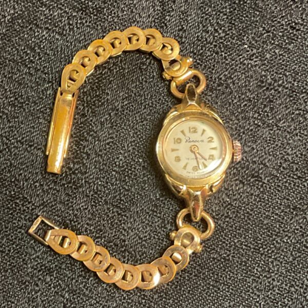 Vintage Renova ladies wristwatch with yellow metal bracelet.