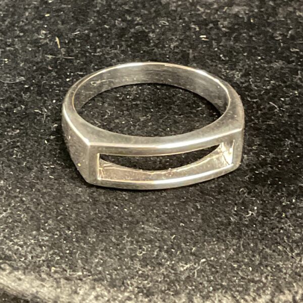 Close-up of a modern silver slot ring, size S, 4.8g.