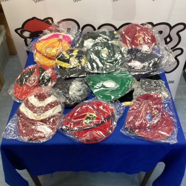 New lot of colourful sporting caps for rugby and cricket.
