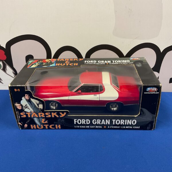 Red and white Starsky and Hutch Ford Gran Torino diecast model.