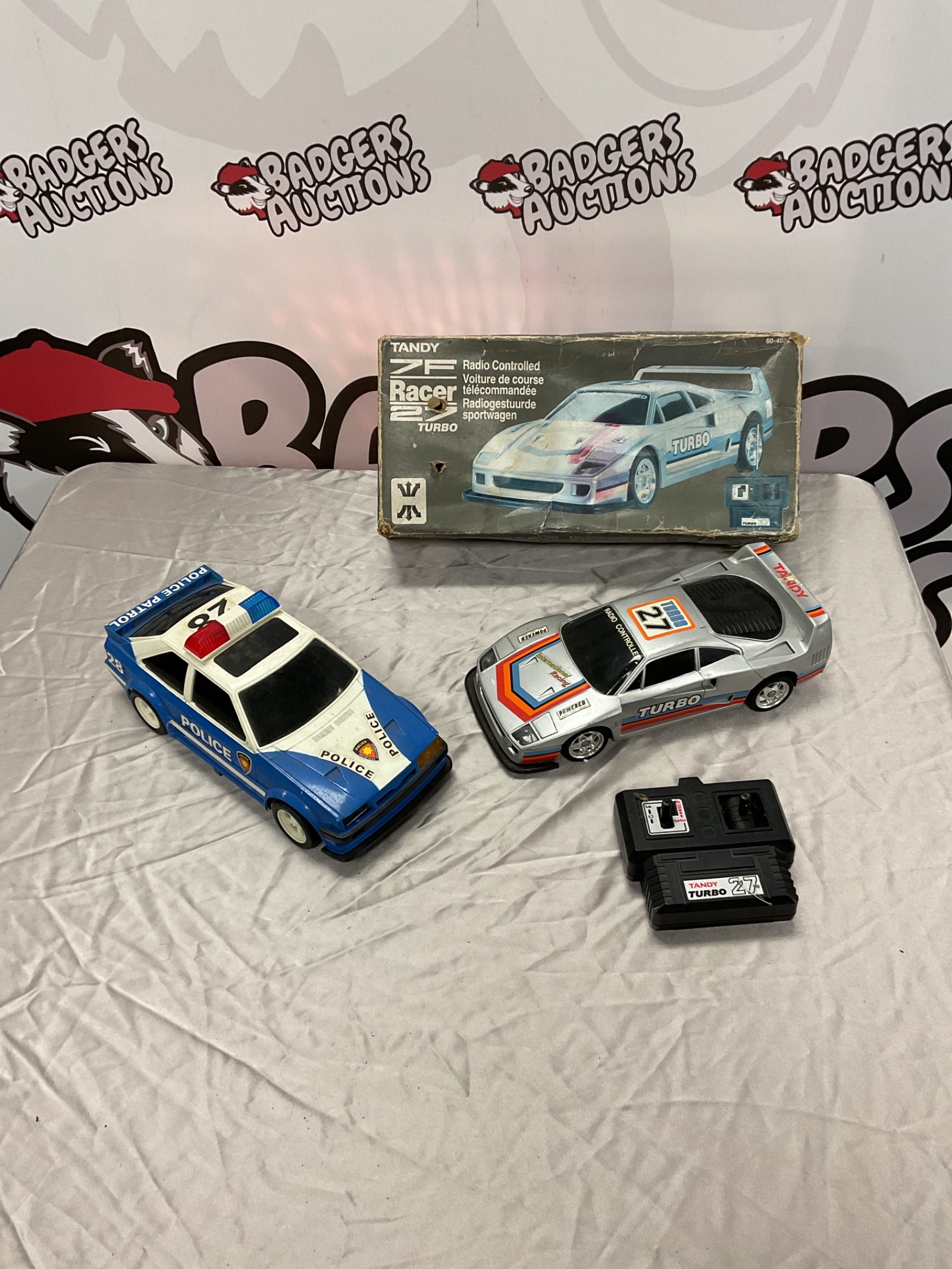 390 Tandy 7F Racer 27 Turbo Radio Controlled Car and toy police car