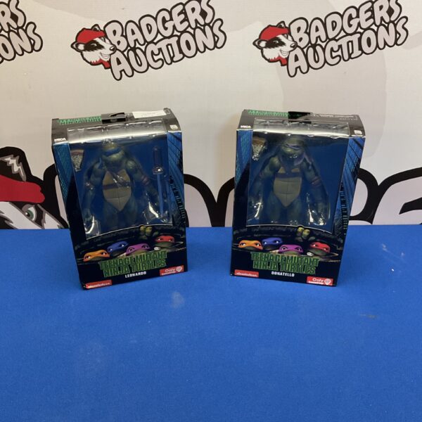 Vintage Teenage Mutant Ninja Turtles Leonardo and Donatello figures in box.