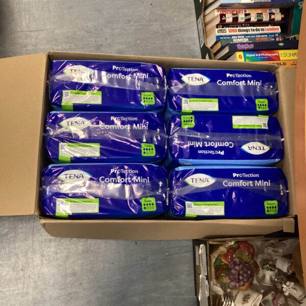 Sealed lot of Tena Super pads for incontinence protection.