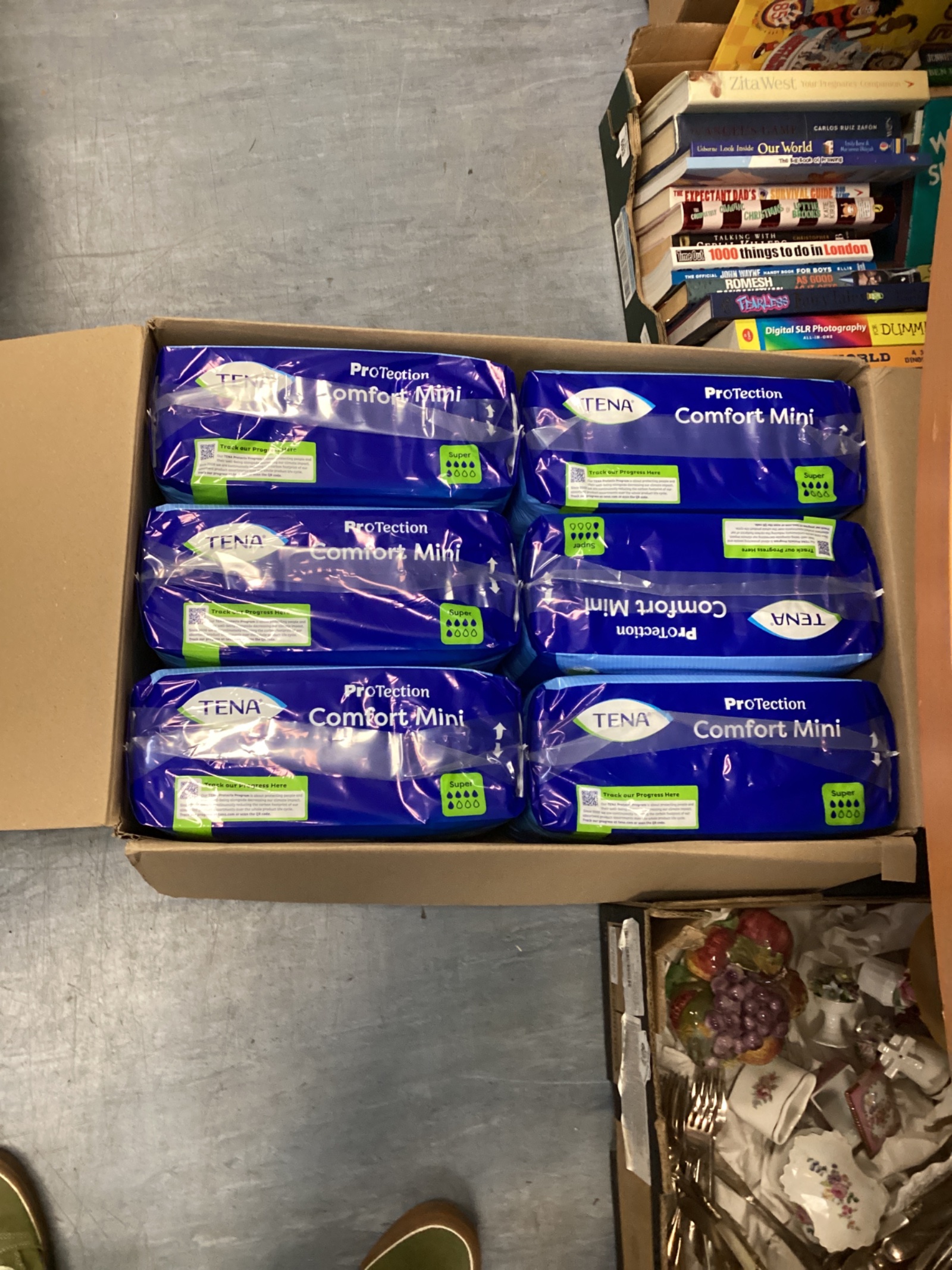602 Six new packs of tena super pads