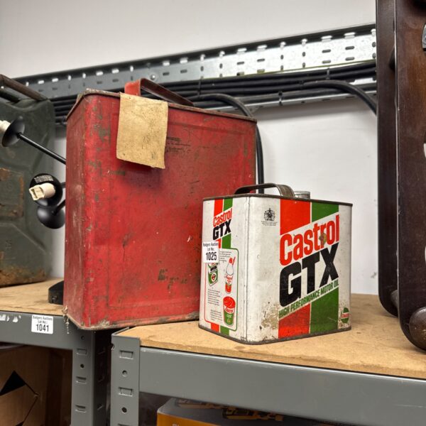 Vintage red Calor fuel can with Castrol GTX oil can.