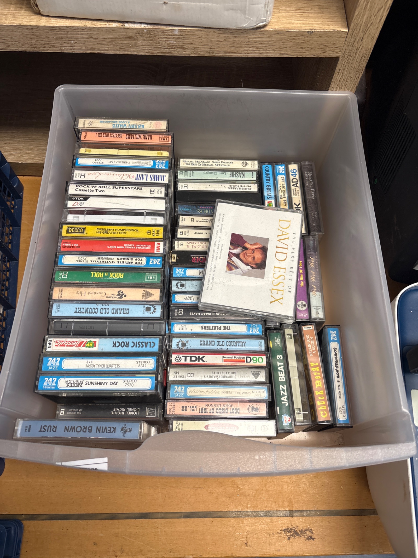 140 Box of mixed music cassettes