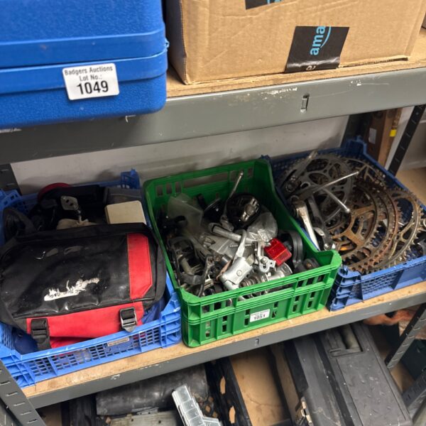 Assorted vintage cycle parts in three trays for restoration.