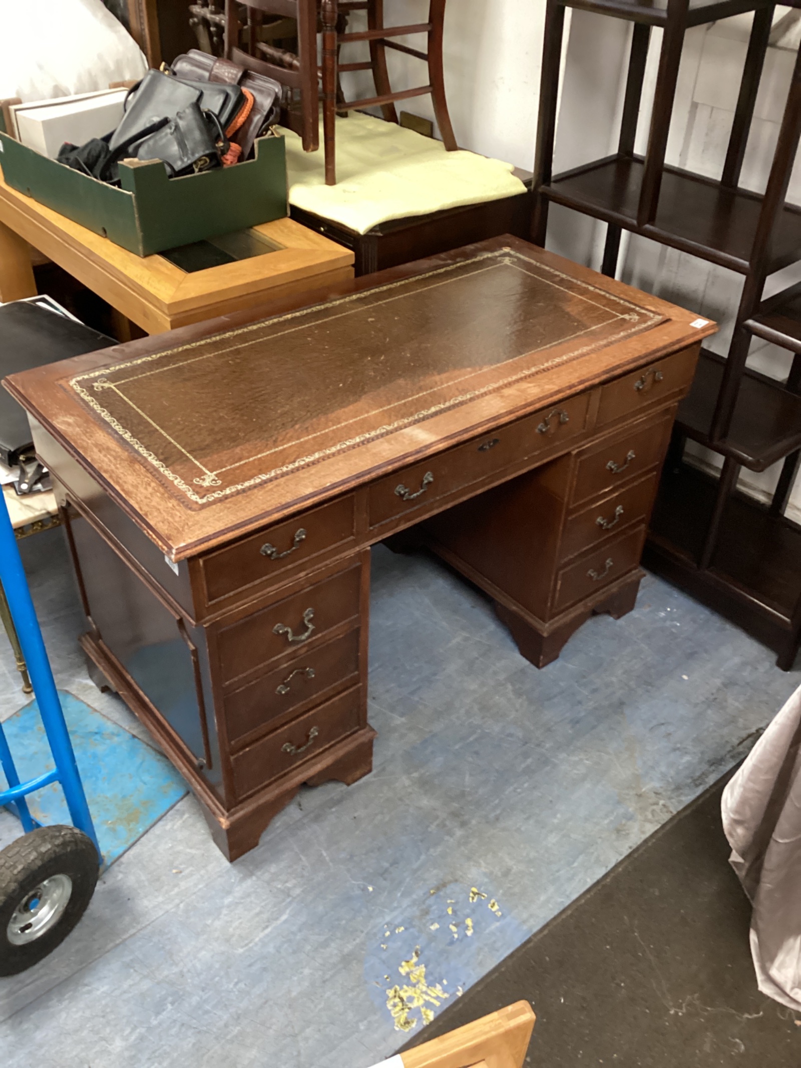 637 A vintage leather topped writing desk