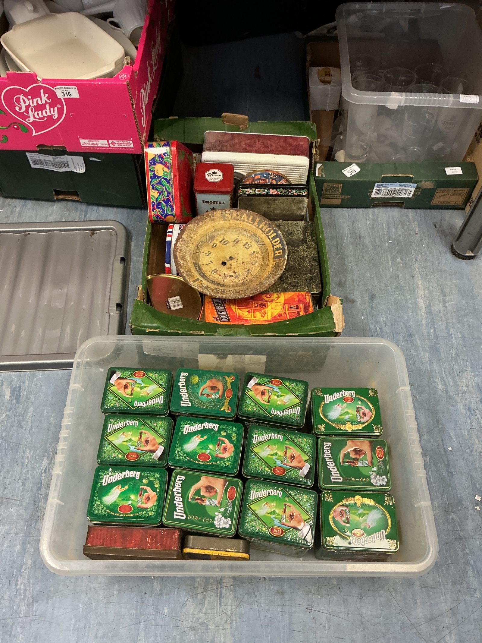 317 Two boxes of metal storage tins