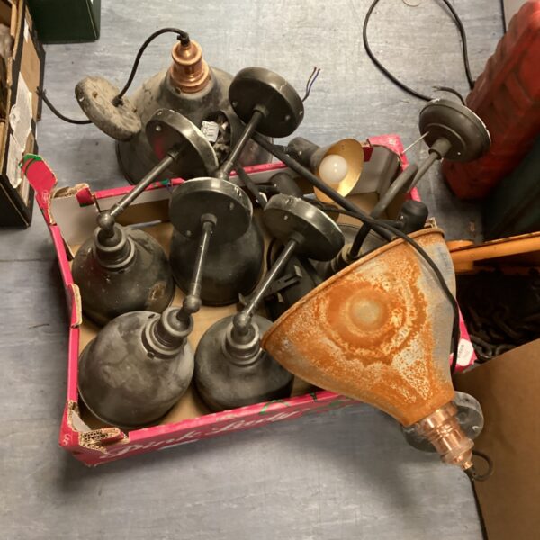 Vintage pendant ceiling lights with enamel shades in a lot.