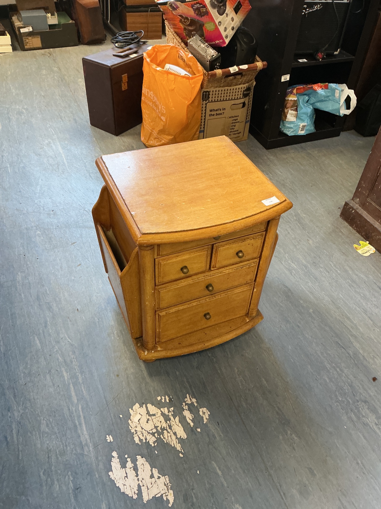 271 Small wooden table with magazine storage pockets
