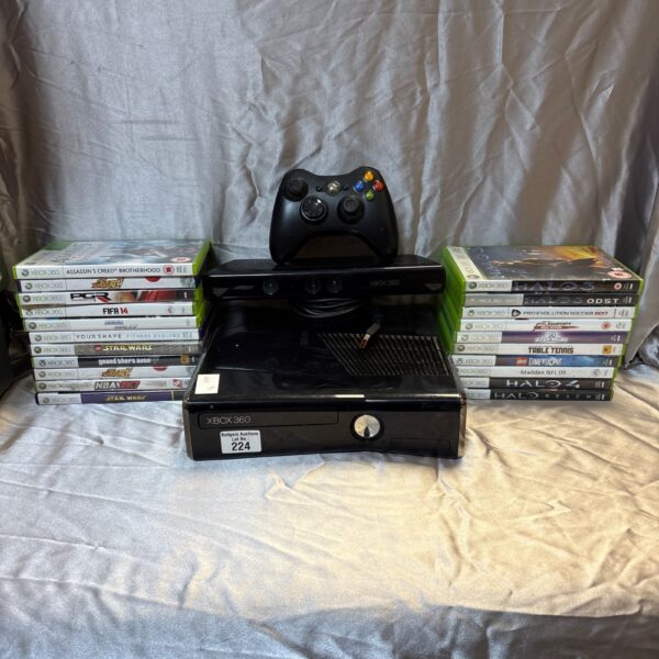 Xbox 360 console with controller and Kinect sensor for gaming.